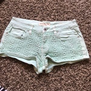 Mint green denim shorts